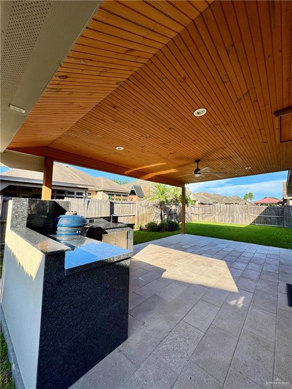 2911 San Rafael Street Mission, TX 78572 - Photo 34 of 38 a view of a backyard with seating area