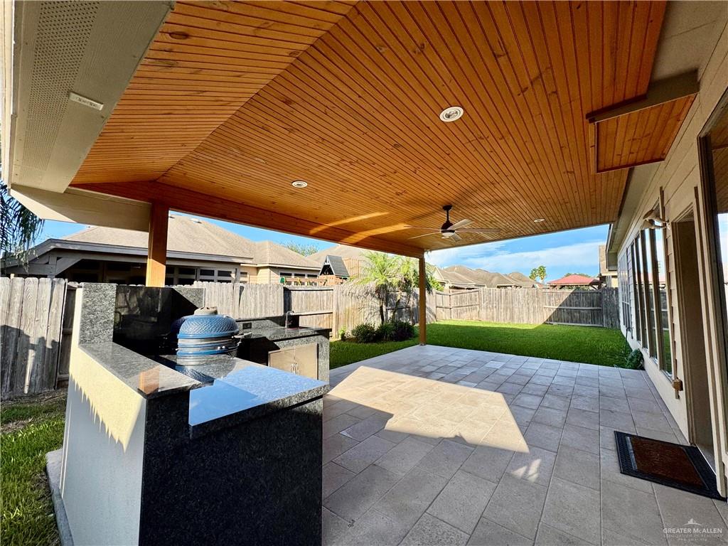 2911 San Rafael Street Mission, TX 78572 - Photo 35 of 38 a view of a backyard with sitting area