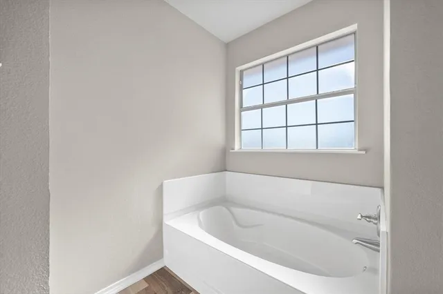 a bathroom with a bathtub