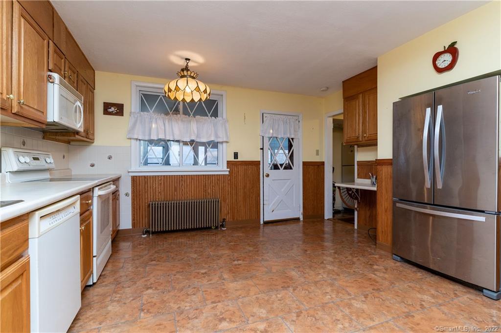 25 Pickett District Road New Milford, CT 06776 - Photo 16 of 34 a kitchen with refrigerator and cabinets