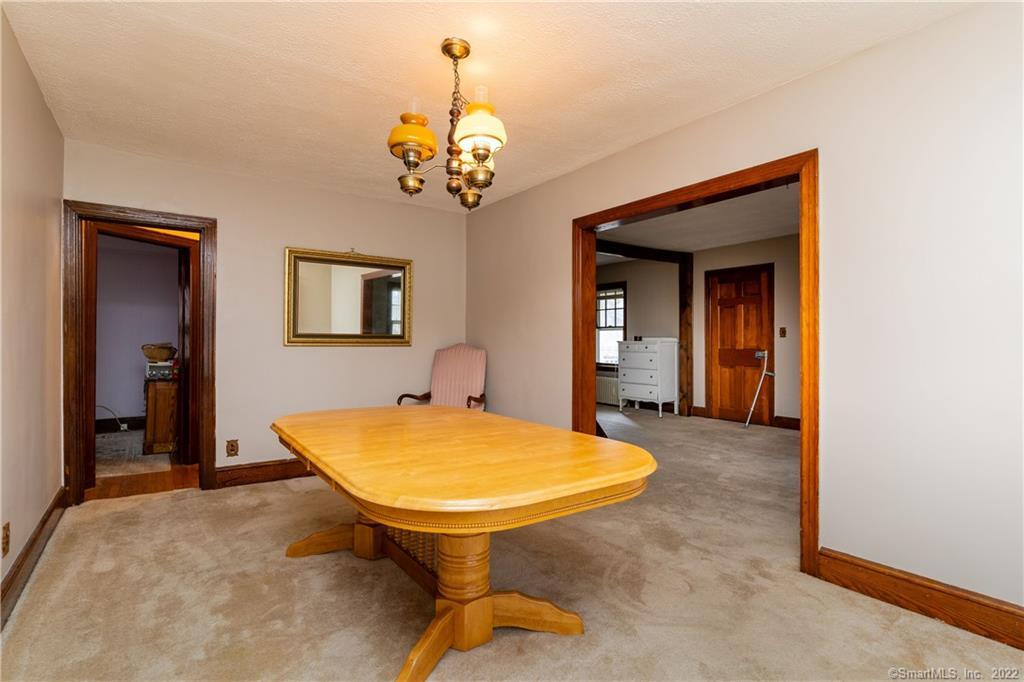 25 Pickett District Road New Milford, CT 06776 - Photo 17 of 34 a view of a room with a chandelier furniture and windows