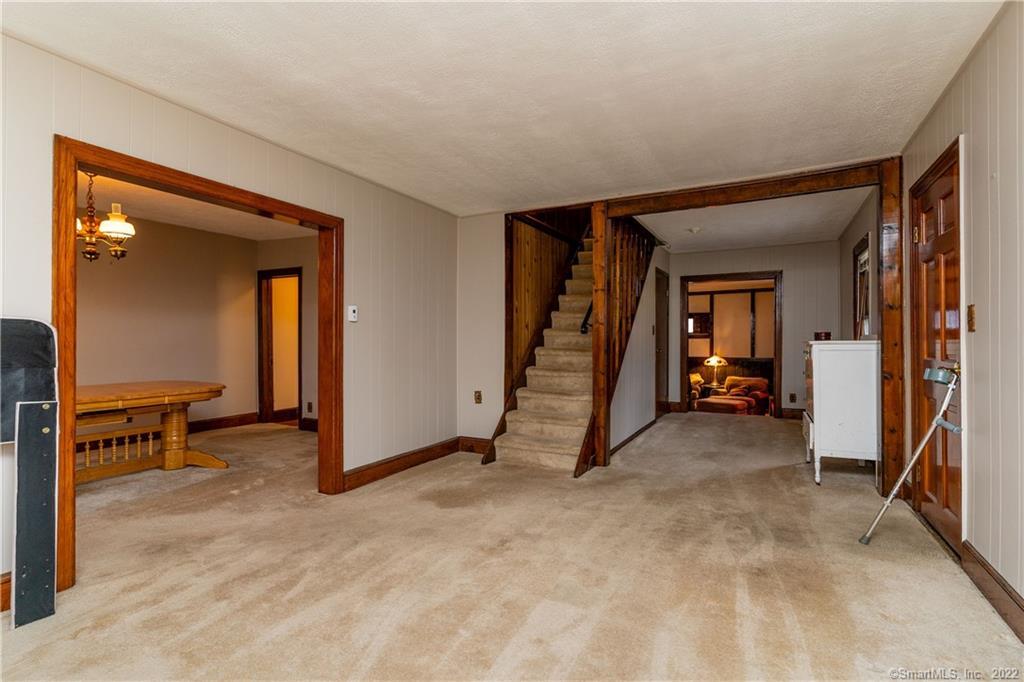25 Pickett District Road New Milford, CT 06776 - Photo 23 of 34 a view of a livingroom with a staircase
