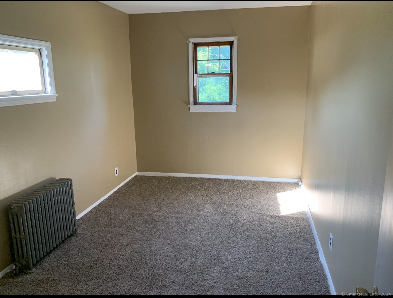 25 Pickett District Road New Milford, CT 06776 - Photo 33 of 34 a view of an empty room with a window