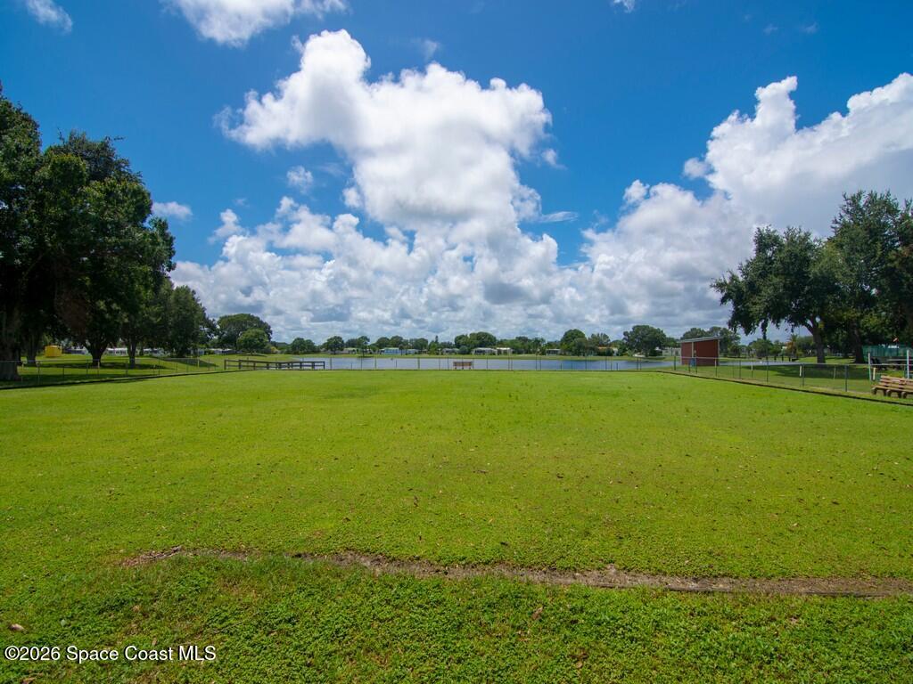7669 Chasta Road Micco, FL 32976 - Photo 32 of 34 a view of an ocean and trees