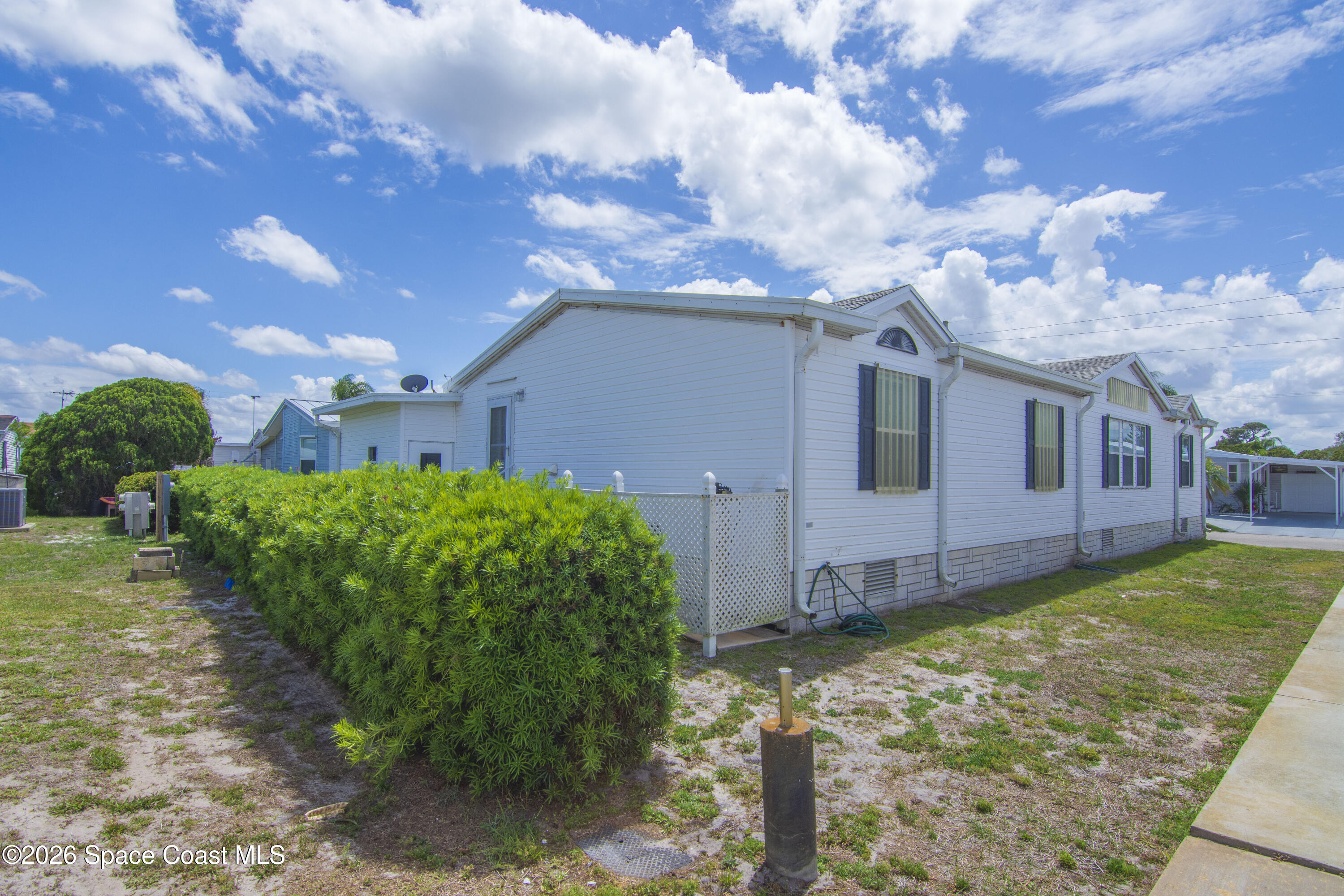 7669 Chasta Road Micco, FL 32976 - Photo 4 of 34 a view of a house with backyard