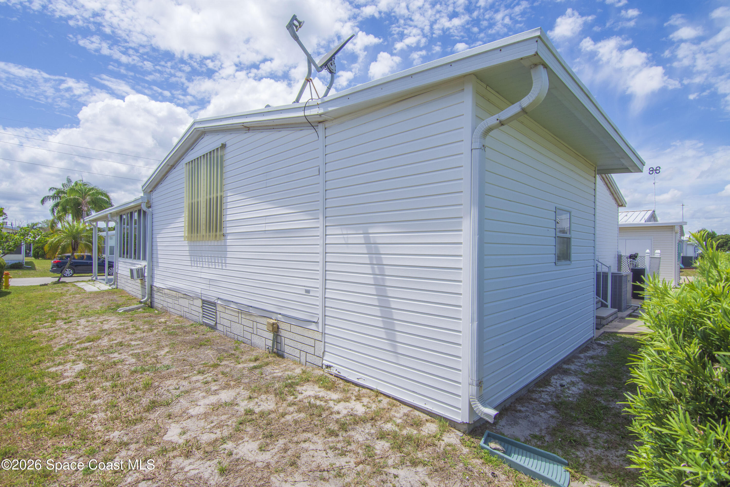 7669 Chasta Road Micco, FL 32976 - Photo 6 of 34 a backyard of a house