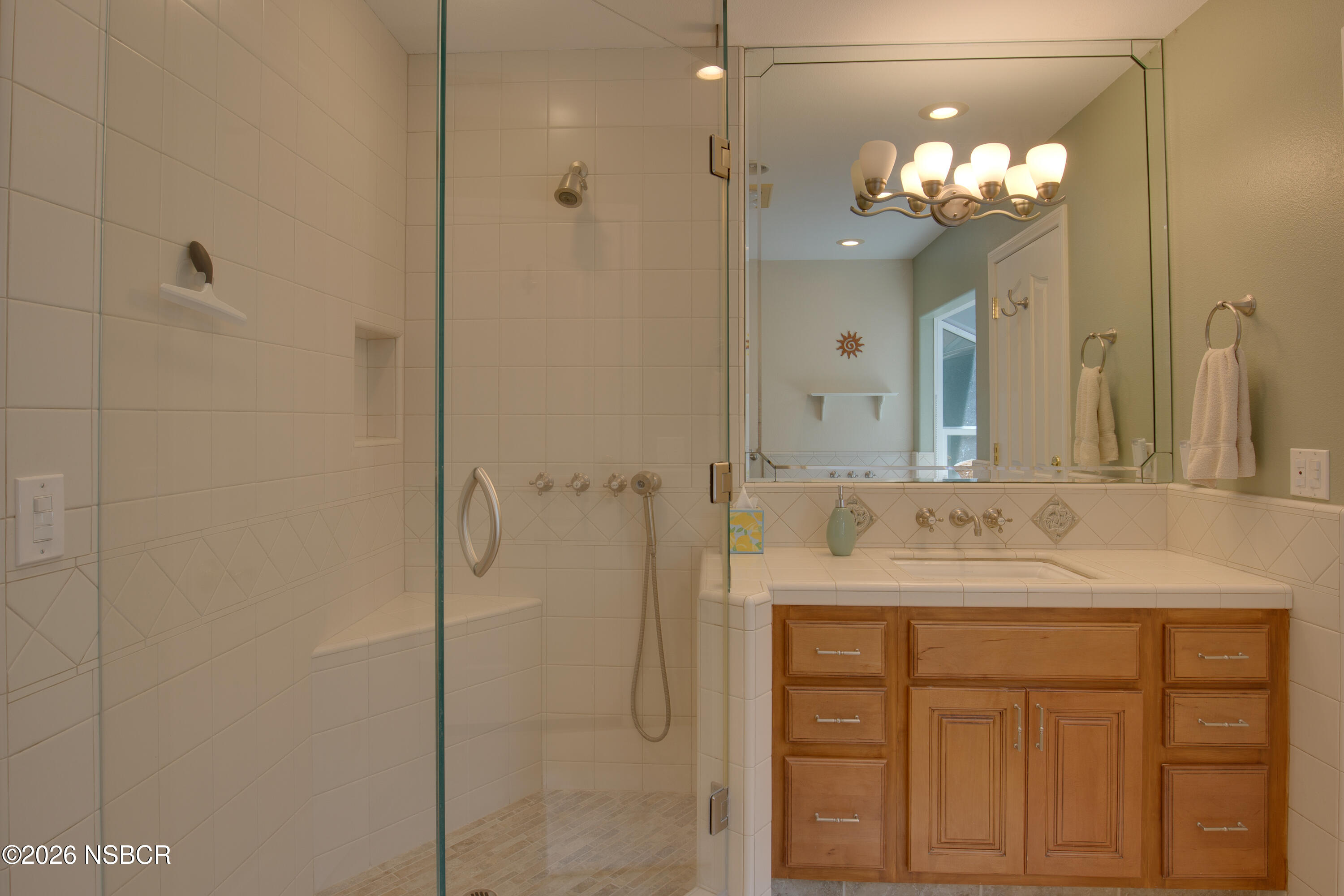 850 Fredensborg Canyon Road Solvang, CA 93463 - Photo 17 of 26 a bathroom with a sink vanity and a mirror