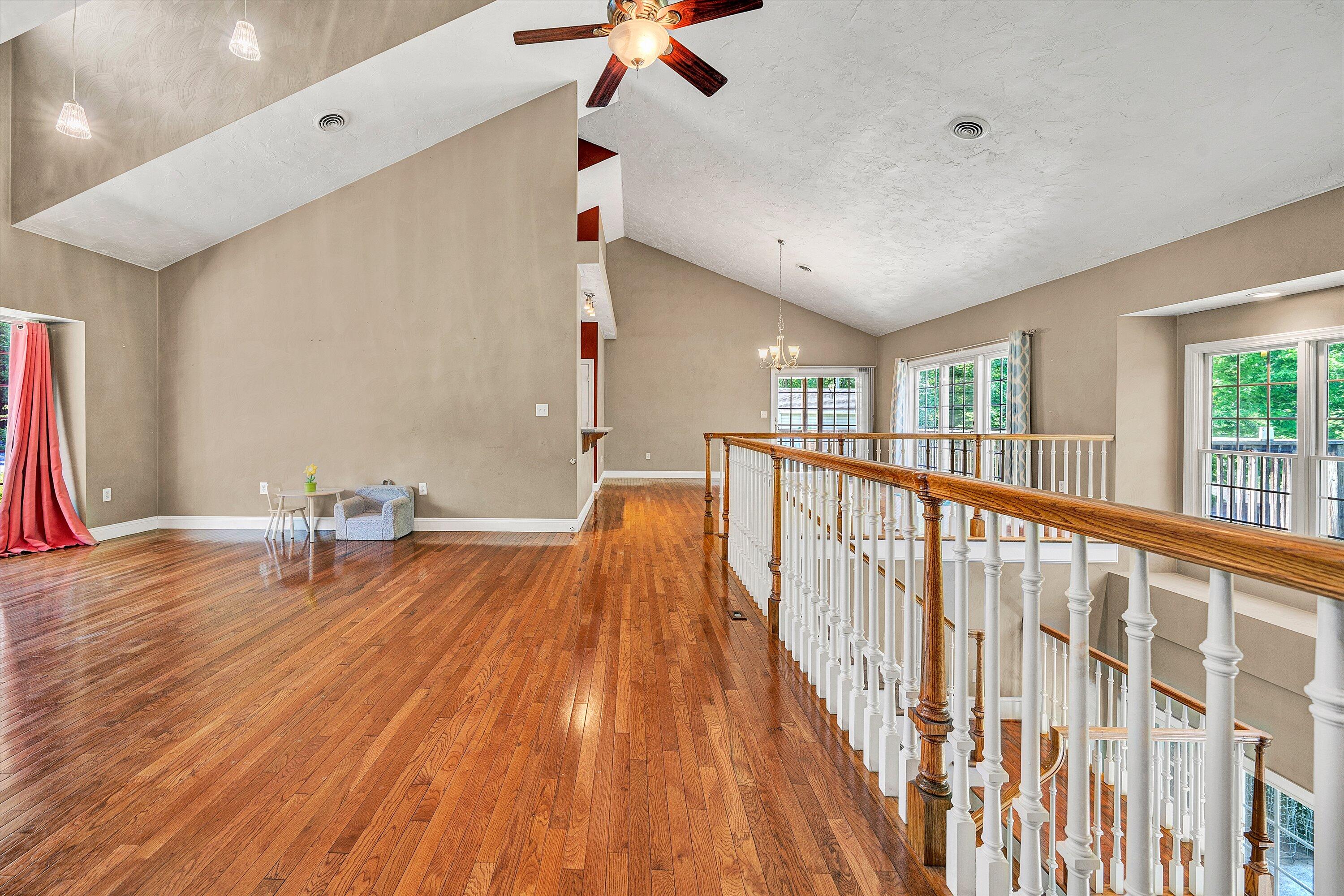 1805 Carroll Road Goodview, VA 24095 - Photo 13 of 61 a view of a living room a wooden floor and dining room