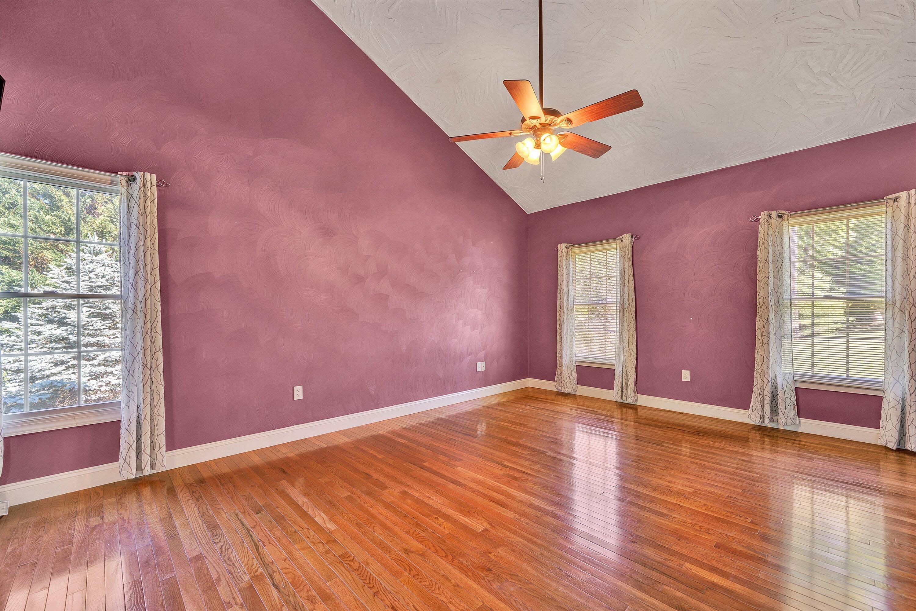 1805 Carroll Road Goodview, VA 24095 - Photo 24 of 61 a view of an empty room with window and wooden floor