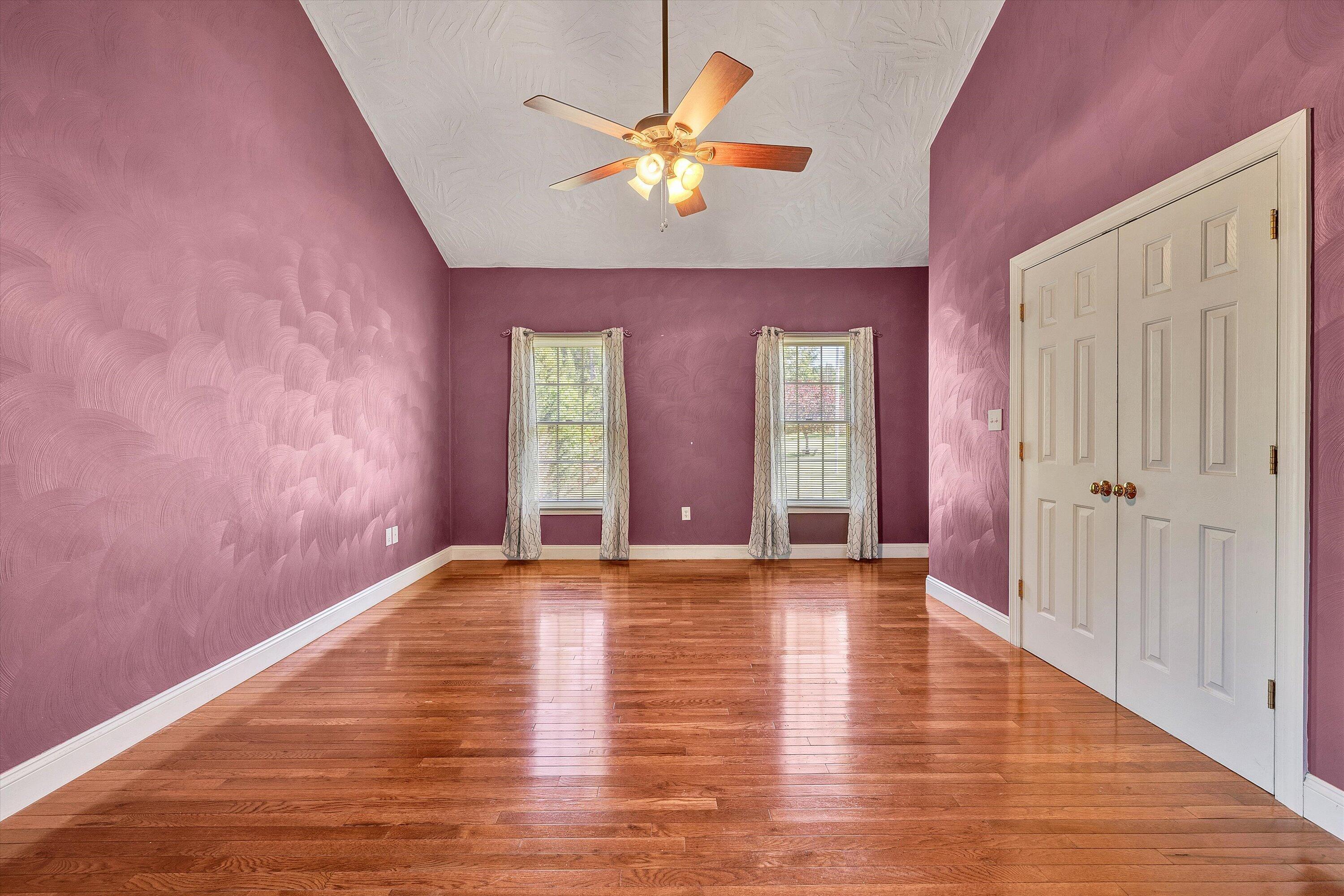 1805 Carroll Road Goodview, VA 24095 - Photo 25 of 61 a view of an empty room with window and wooden floor
