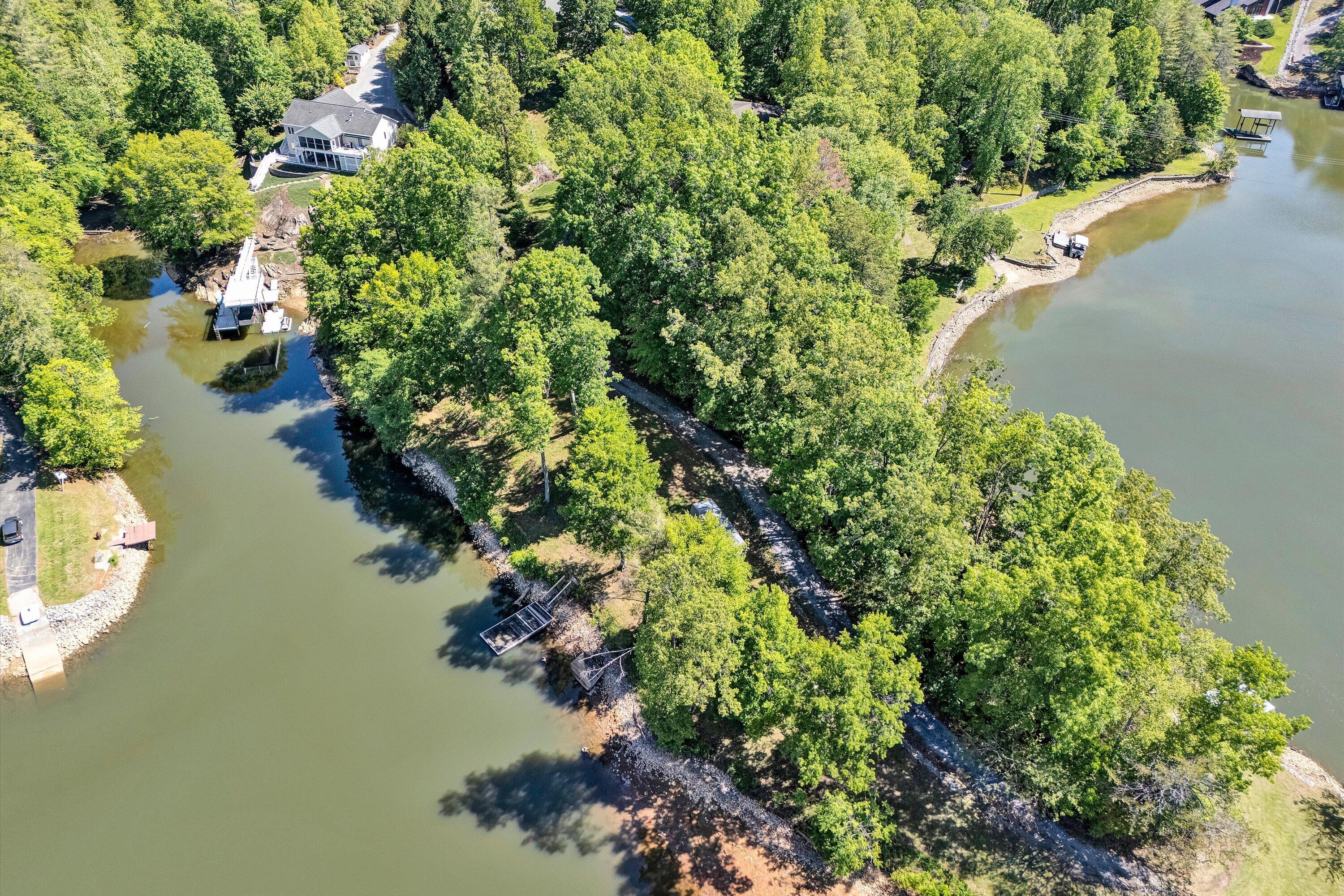 1805 Carroll Road Goodview, VA 24095 - Photo 3 of 61 a view of a lake with a yard
