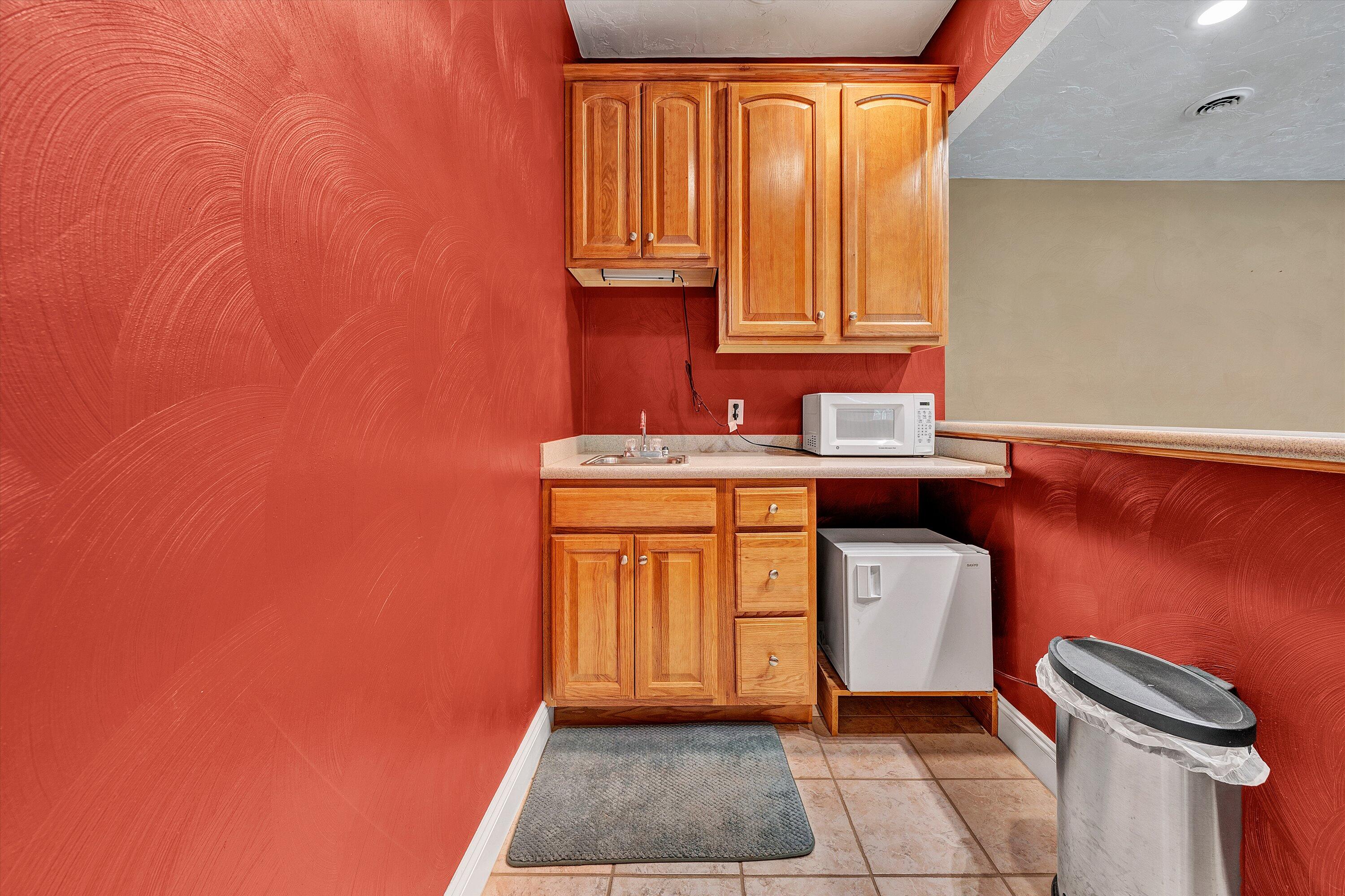 1805 Carroll Road Goodview, VA 24095 - Photo 43 of 61 a utility room with a sink a washer and dryer