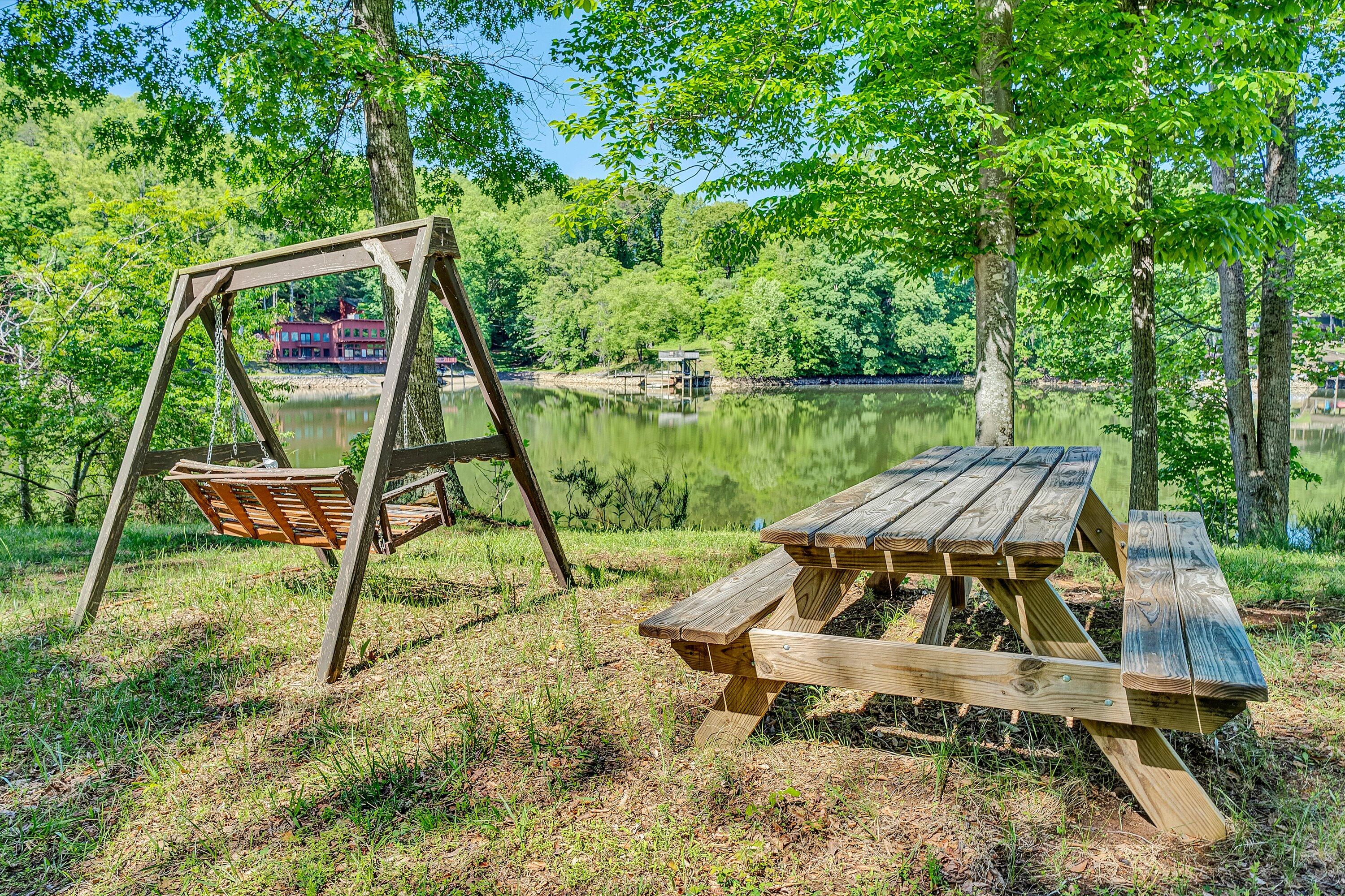 1805 Carroll Road Goodview, VA 24095 - Photo 50 of 61 a backyard of a house with table and chairs
