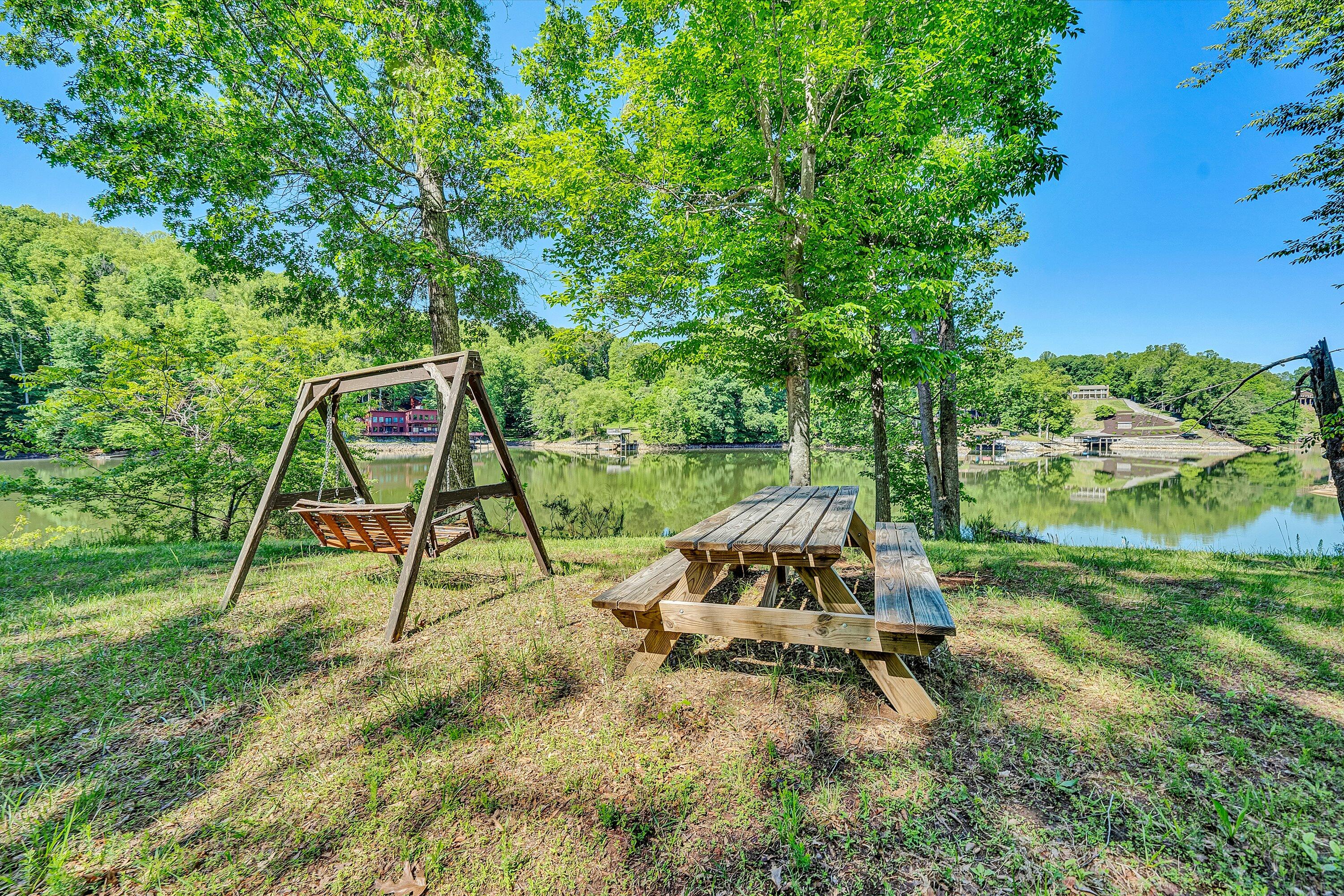 1805 Carroll Road Goodview, VA 24095 - Photo 51 of 61 a view of a garden with a bench
