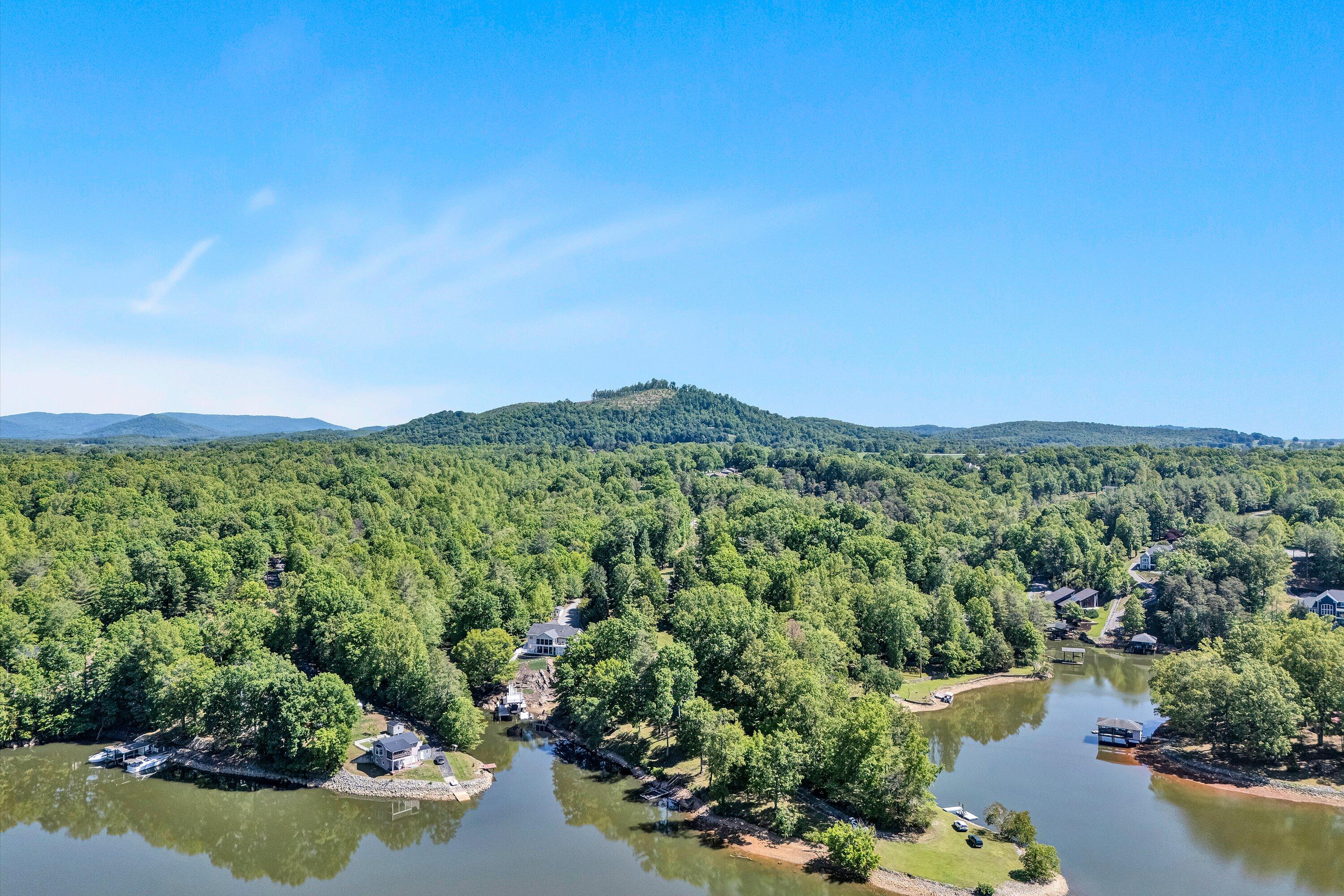 1805 Carroll Road Goodview, VA 24095 - Photo 52 of 61 a view of a lake with mountains in the background