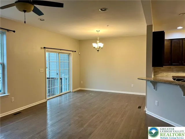 a view of a kitchen with a sink and dishwasher