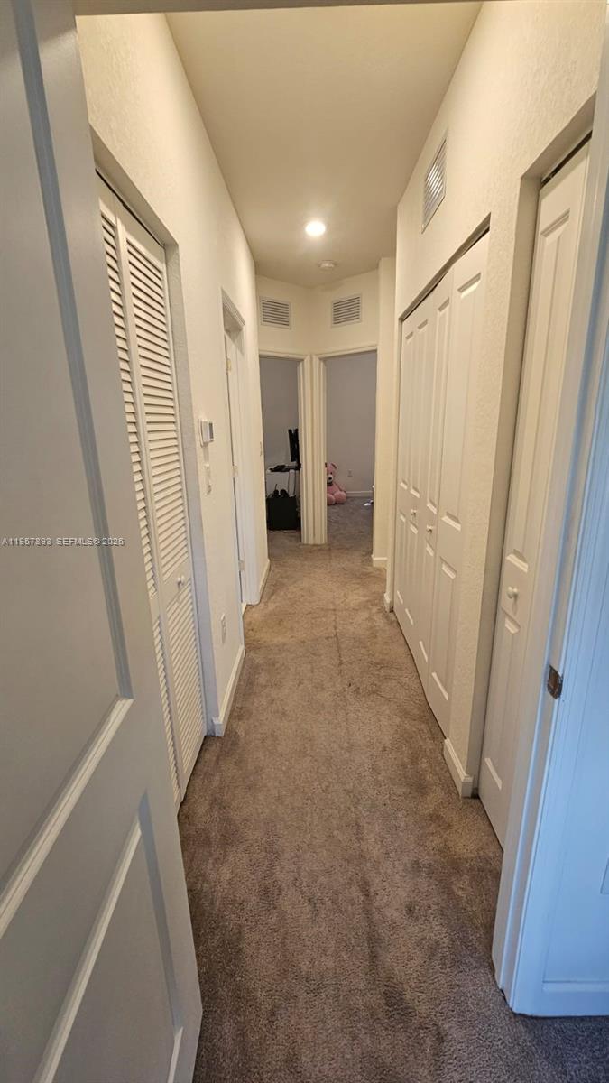 1146 Southeast 26th Street Homestead, FL 33035 - Photo 21 of 42 a view of a hallway