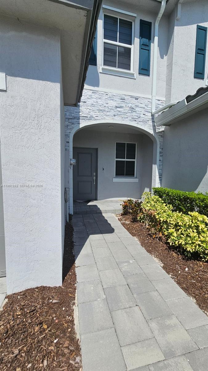 1146 Southeast 26th Street Homestead, FL 33035 - Photo 3 of 42 a front view of a house