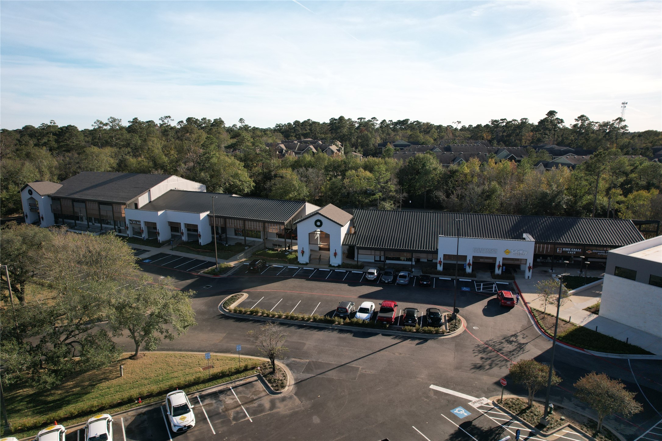 26403 Hunters Hollow Drive Spring, TX 77380 - Photo 31 of 34 Minutes away from Grogan's Mill Village Center - enjoy delicious food and more! Farmer's Market every Saturday!