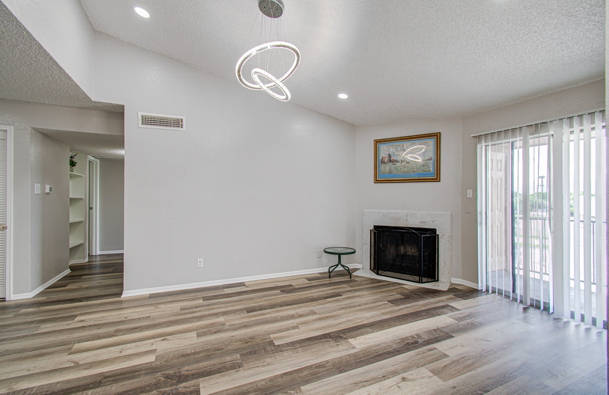 10101 South Gessner Road, Unit 405 Houston, TX 77071 - Photo 6 of 27 a bedroom with a bed and a fireplace
