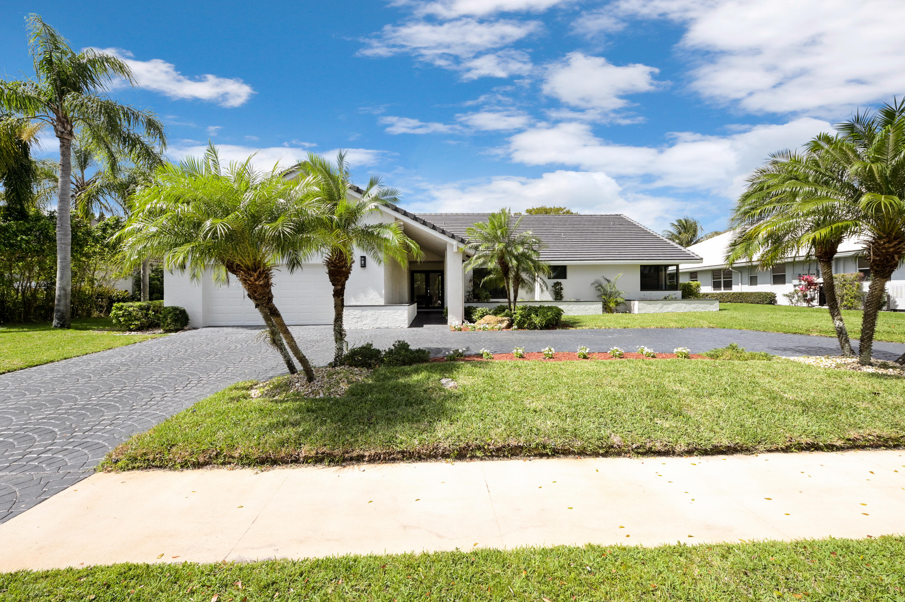 4912 Bocaire Boulevard Boca Raton, FL 33487 - Photo 2 of 36 front