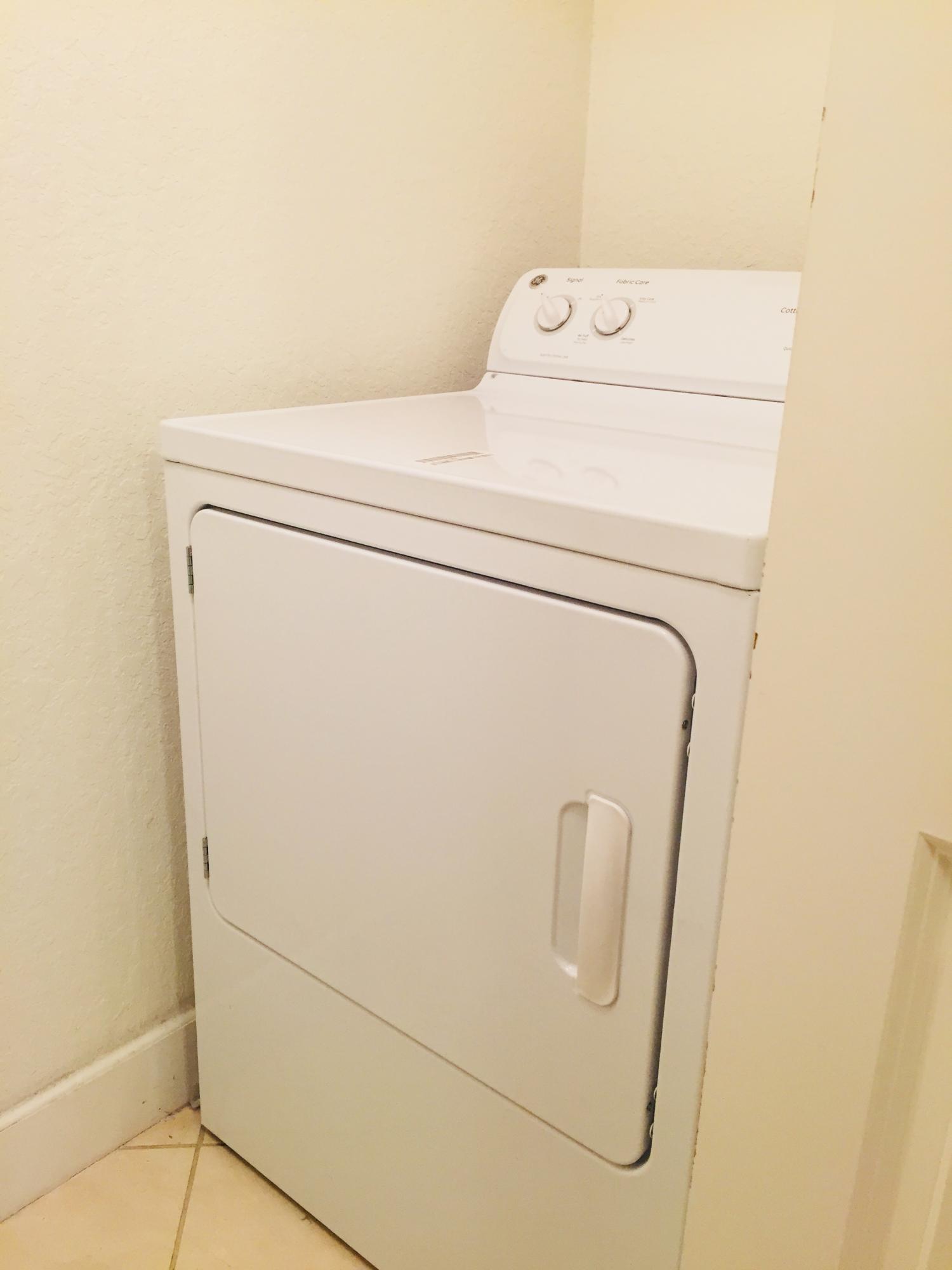 1203 Renaissance Way Boynton Beach, FL 33426 - Photo 12 of 24 a utility room with dryer and washer