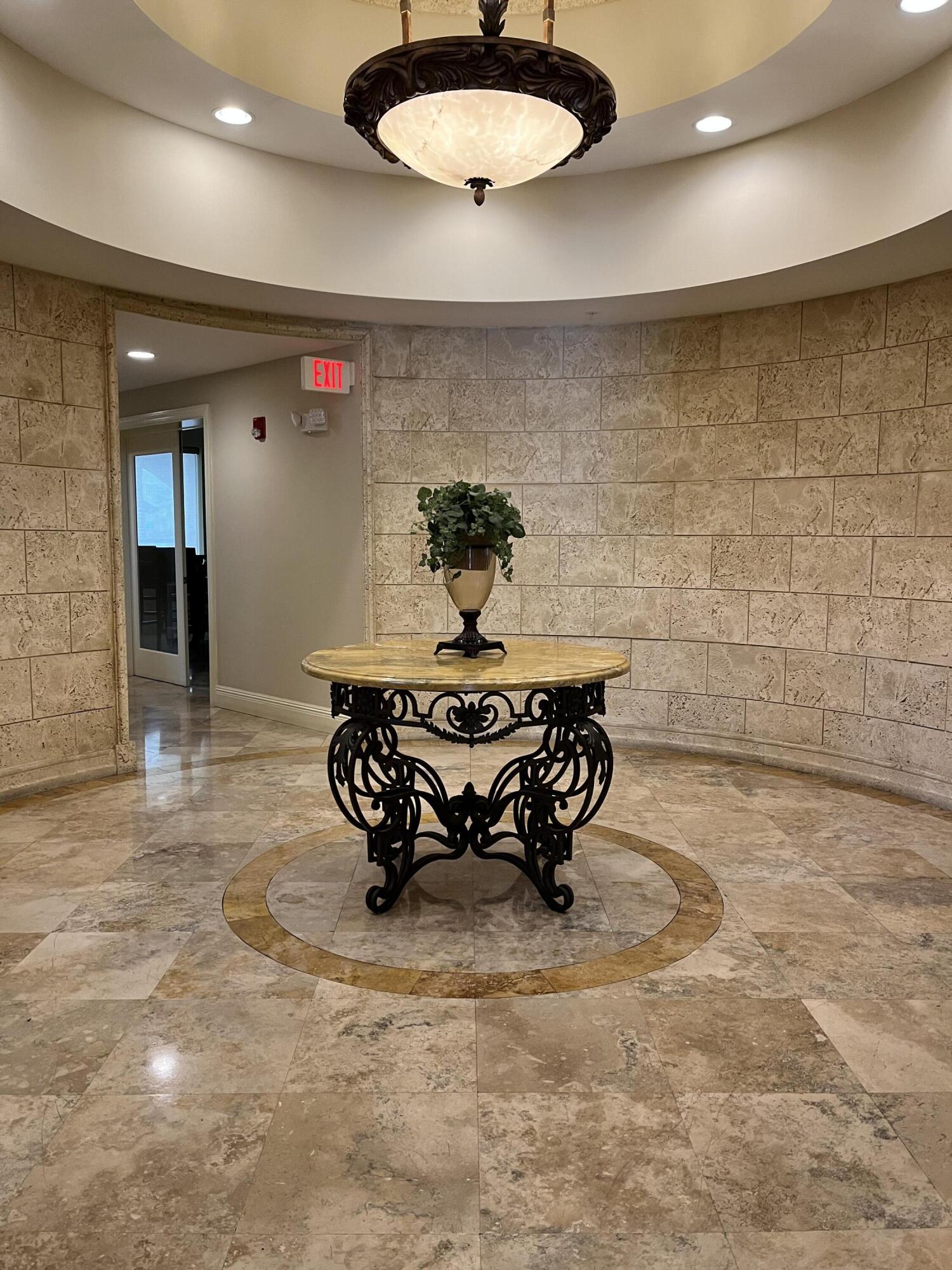 1203 Renaissance Way Boynton Beach, FL 33426 - Photo 15 of 24 a kitchen with a sink and a stove