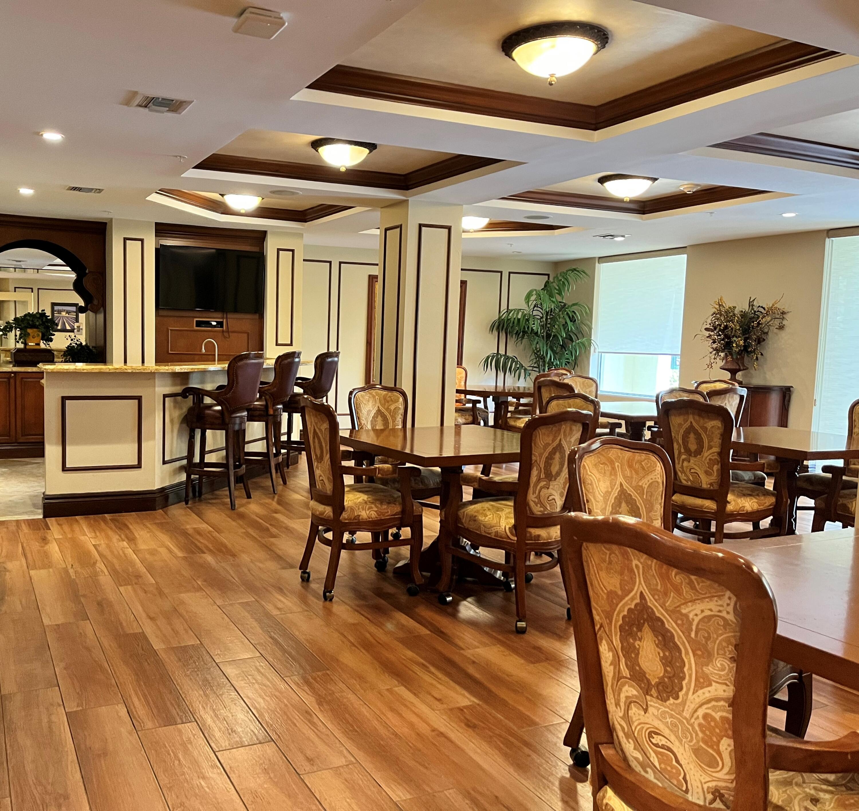 1203 Renaissance Way Boynton Beach, FL 33426 - Photo 17 of 24 a view of a dining room with furniture window and wooden floor