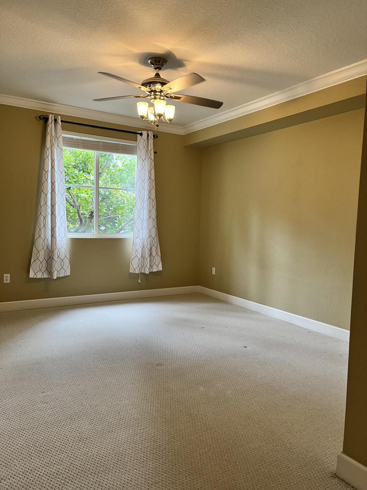 1203 Renaissance Way Boynton Beach, FL 33426 - Photo 5 of 24 a view of an empty room with a window