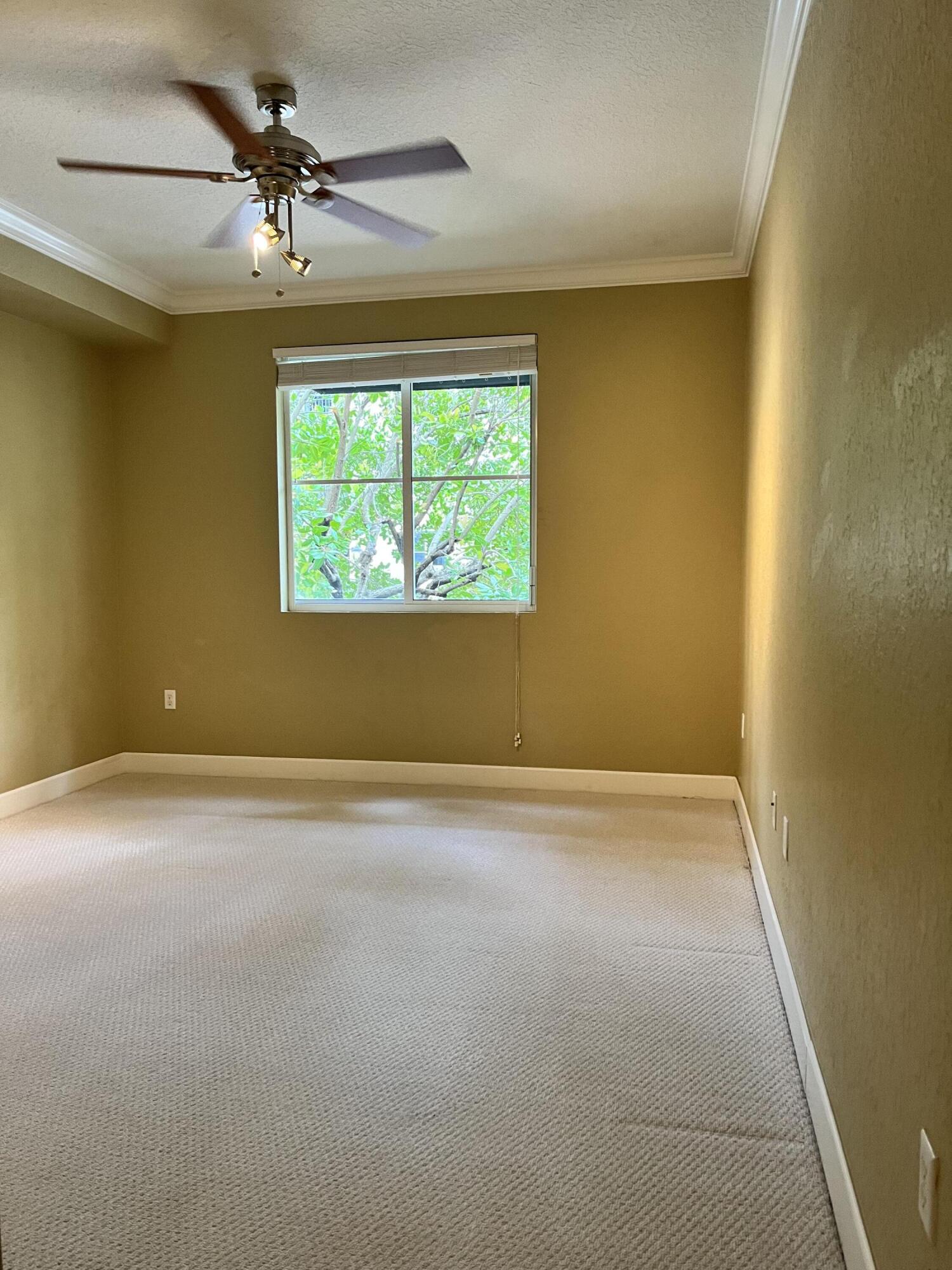 1203 Renaissance Way Boynton Beach, FL 33426 - Photo 8 of 24 a view of an empty room with a window