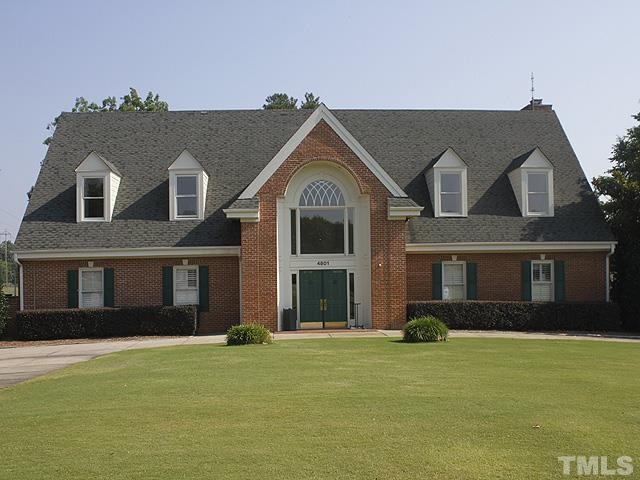 2170 Metacomet Way Raleigh, NC 27604 - Photo 14 of 15 a front view of a house with a garden