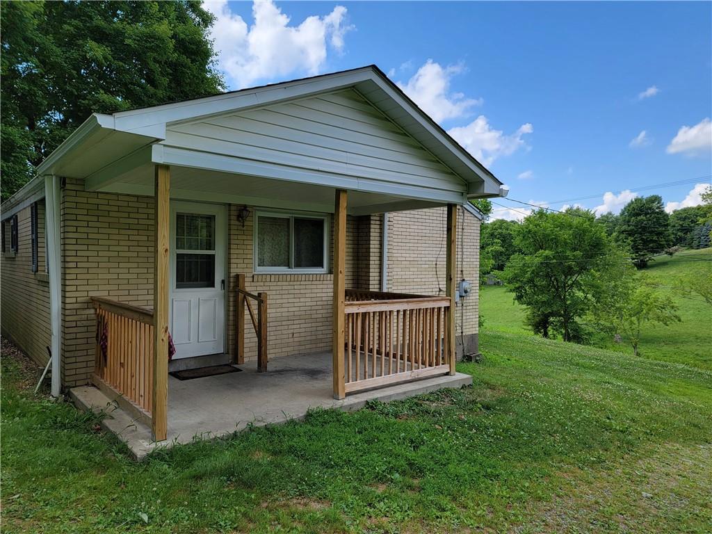 482 Gas Valley Road Georgetown, PA 15043 - Photo 2 of 10 a view of a house with backyard and porch