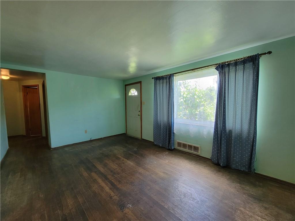 482 Gas Valley Road Georgetown, PA 15043 - Photo 6 of 10 an empty room with wooden floor and windows