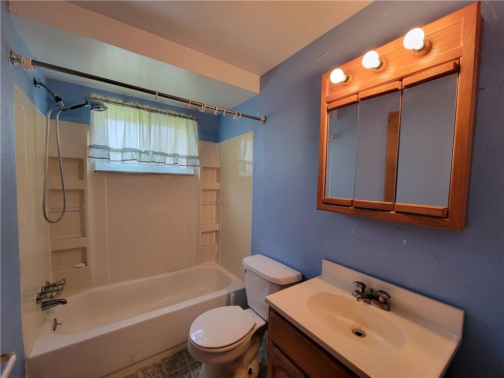 482 Gas Valley Road Georgetown, PA 15043 - Photo 8 of 10 a bathroom with a sink toilet and shower