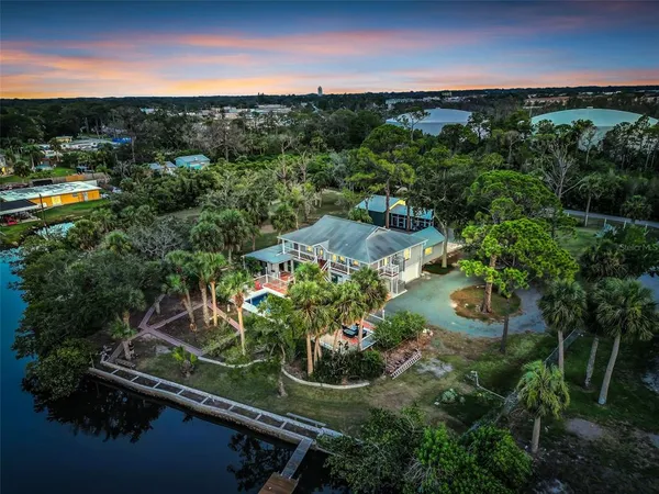 a view of a garden with an outdoor seating