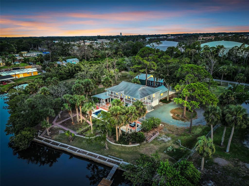 a view of a garden with an outdoor seating
