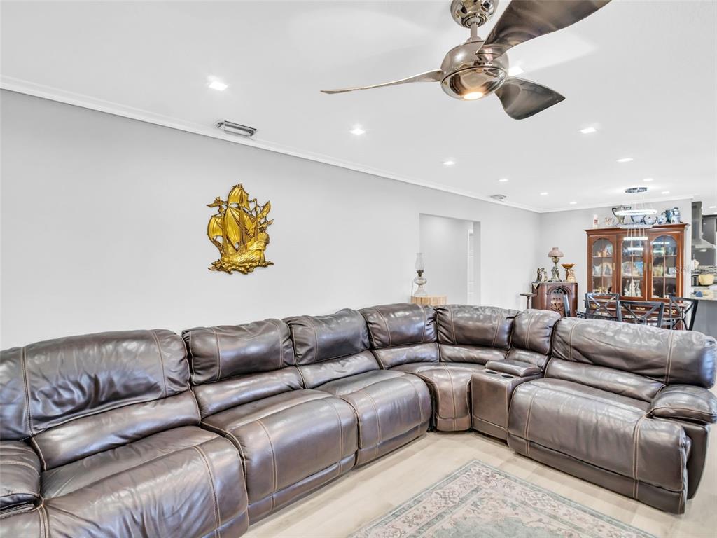 4915 S Road New Port Richey, FL 34652 - Photo 14 of 93 a living room with furniture and couch