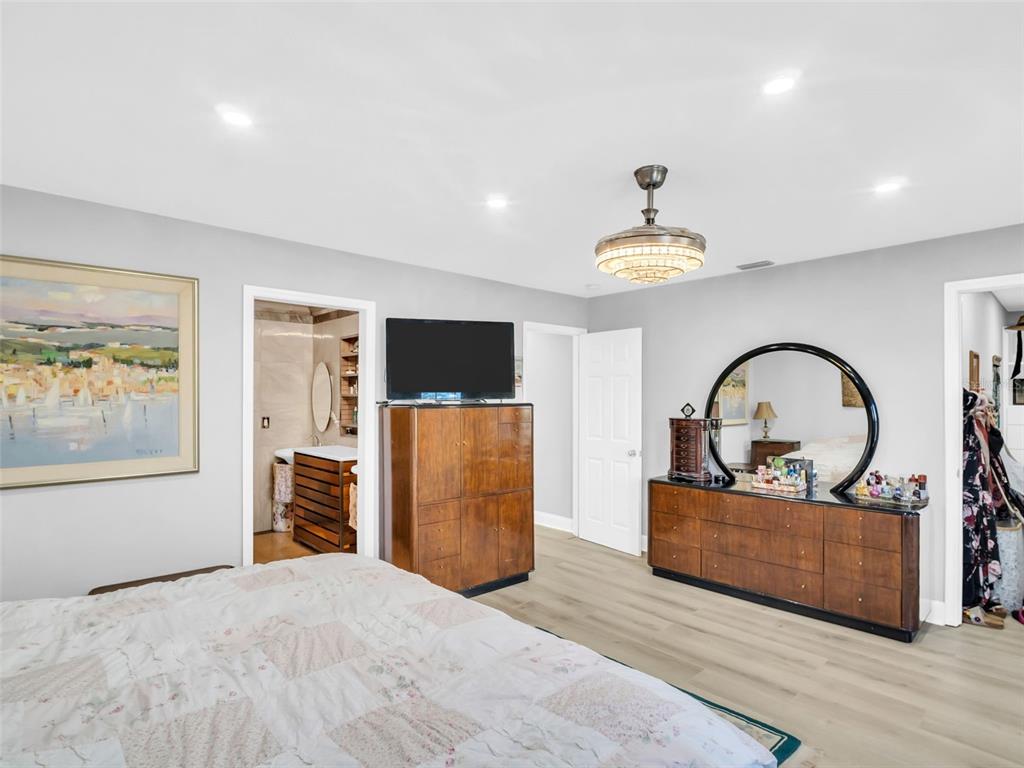 4915 S Road New Port Richey, FL 34652 - Photo 21 of 93 a view of a livingroom with furniture and cabinet