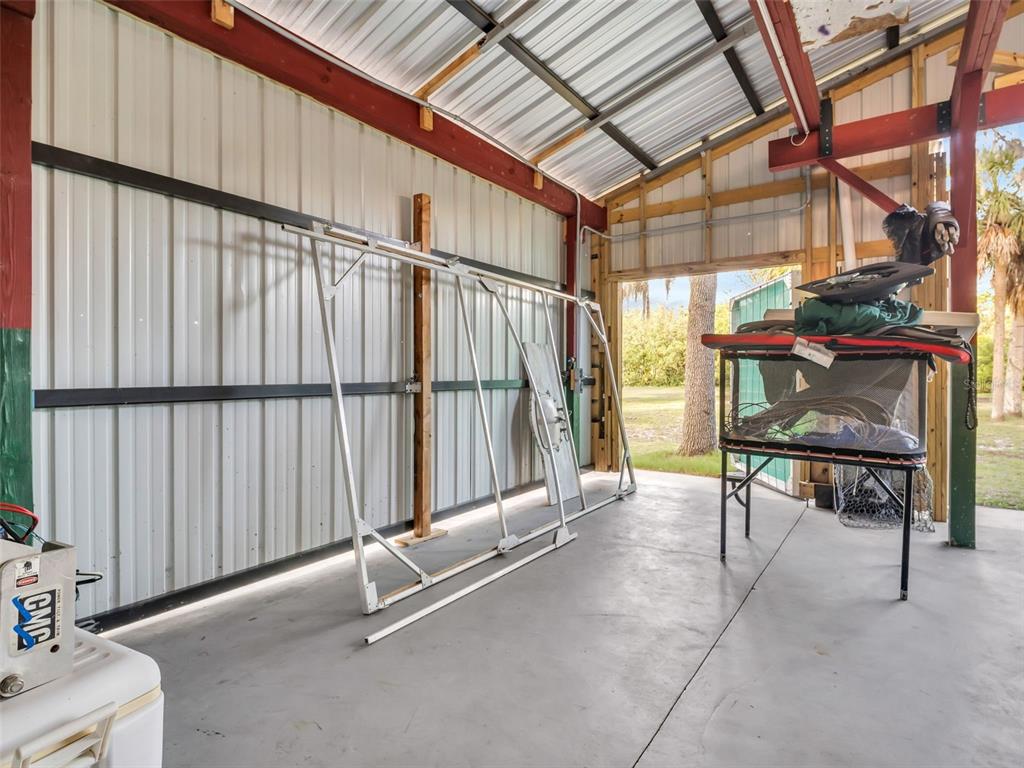 4915 S Road New Port Richey, FL 34652 - Photo 40 of 93 a view of an outdoor space with porch
