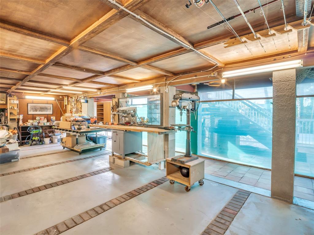 4915 S Road New Port Richey, FL 34652 - Photo 44 of 93 a outdoor space with lots of furniture and garden view