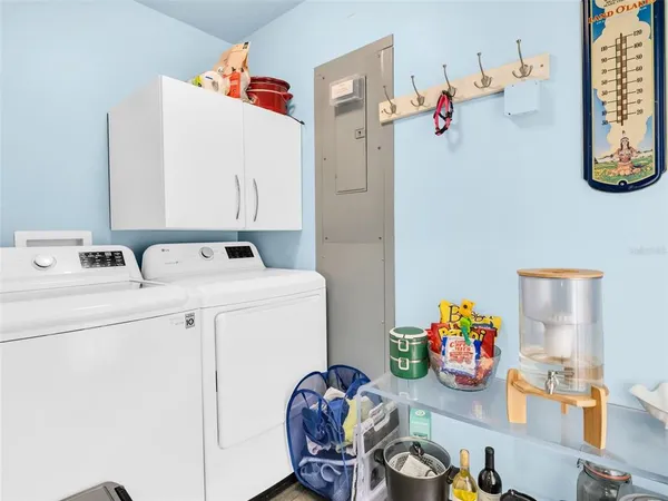an aerial view of a houses with city view