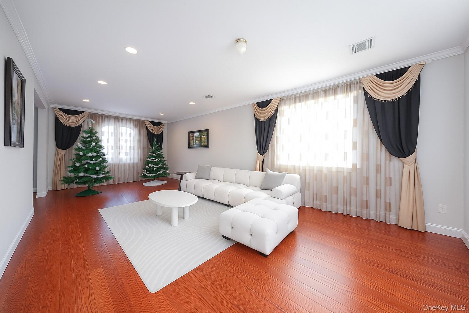 104 Highland Road Staten Island, NY 10308 - Photo 17 of 46 Living room featuring ornamental molding, hardwood / wood-style flooring, and recessed lighting