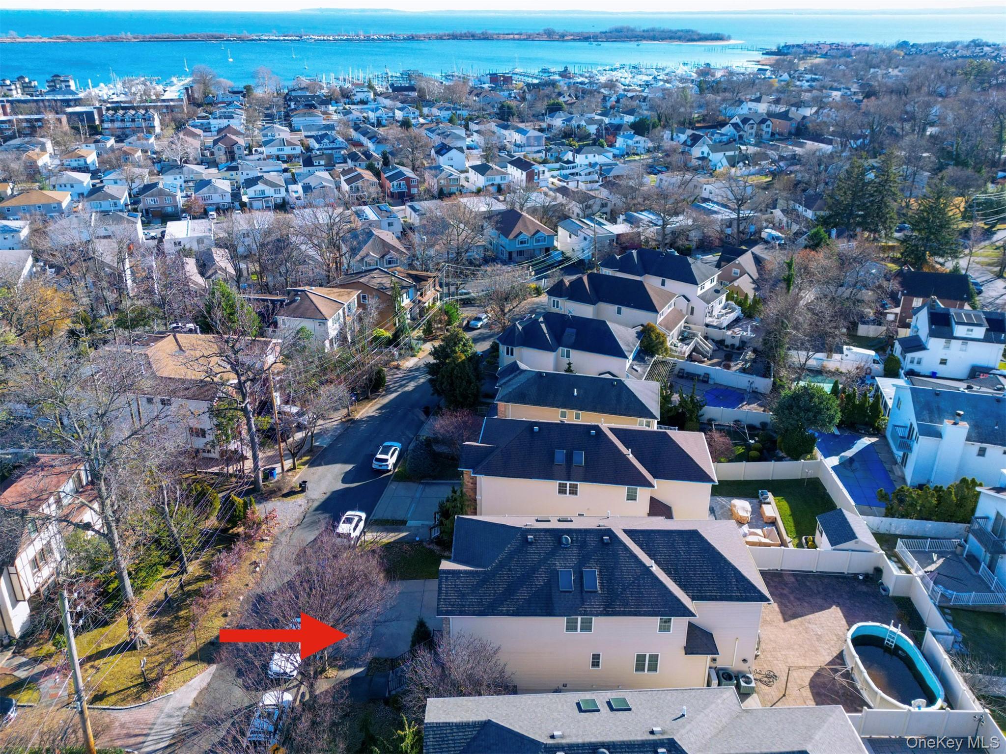 104 Highland Road Staten Island, NY 10308 - Photo 26 of 46 Aerial view of property and surrounding area with nearby suburban area and a nearby body of water