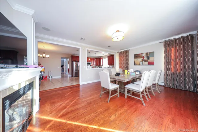 a kitchen with stainless steel appliances granite countertop a sink refrigerator stove and microwave