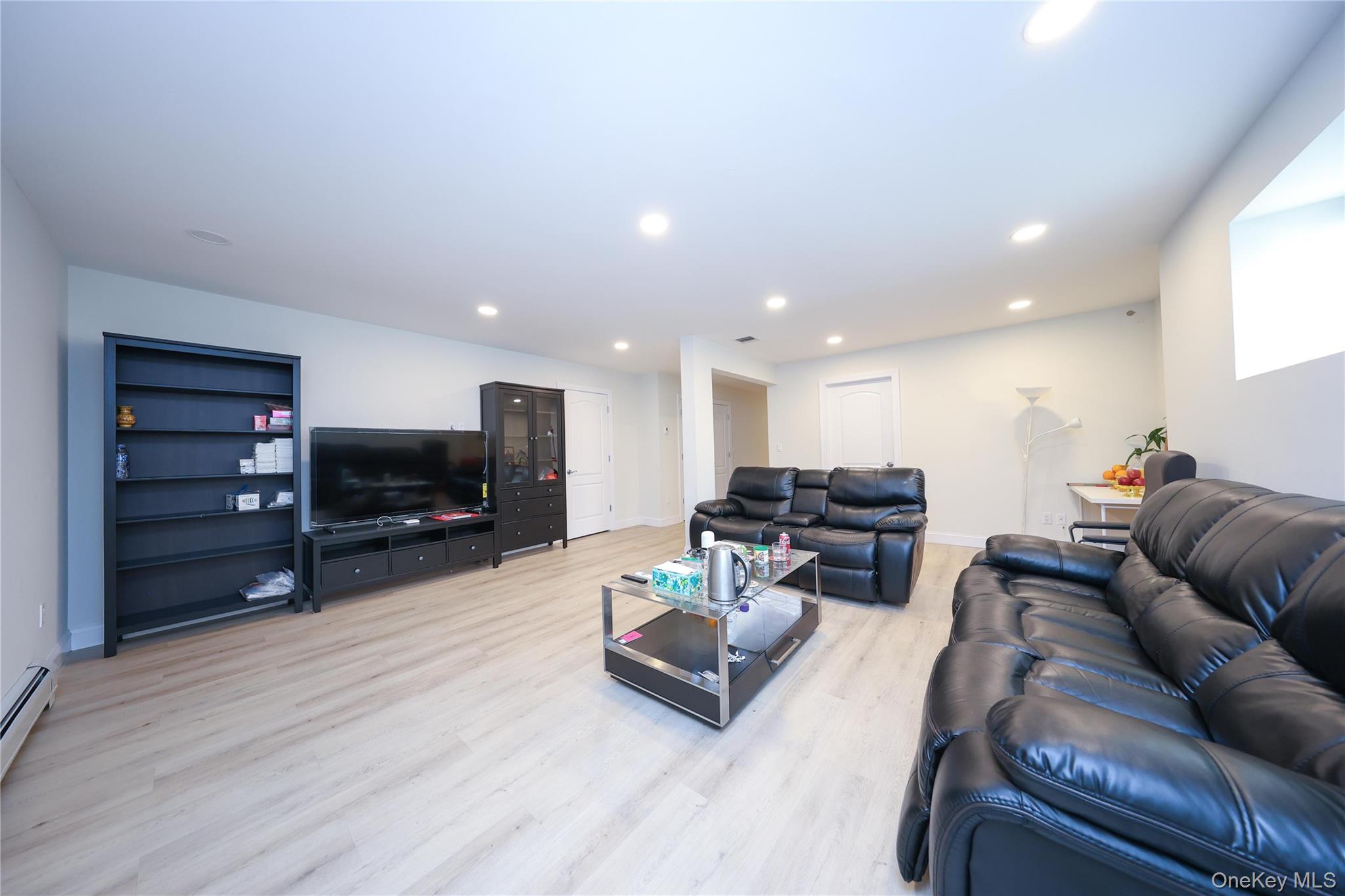104 Highland Road Staten Island, NY 10308 - Photo 36 of 46 Living area featuring recessed lighting and light wood-style floors