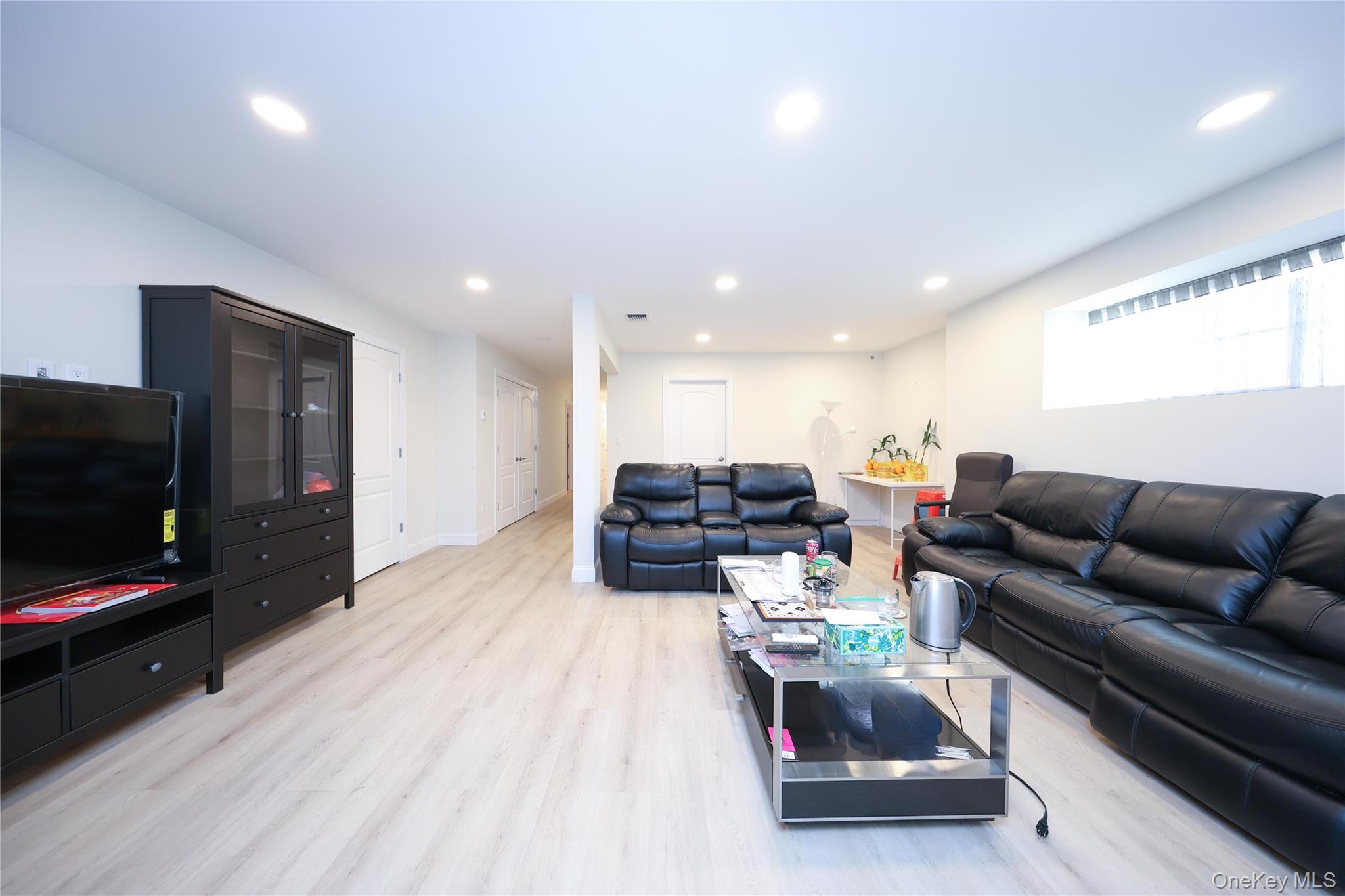 104 Highland Road Staten Island, NY 10308 - Photo 37 of 46 Living area featuring light wood-type flooring and recessed lighting