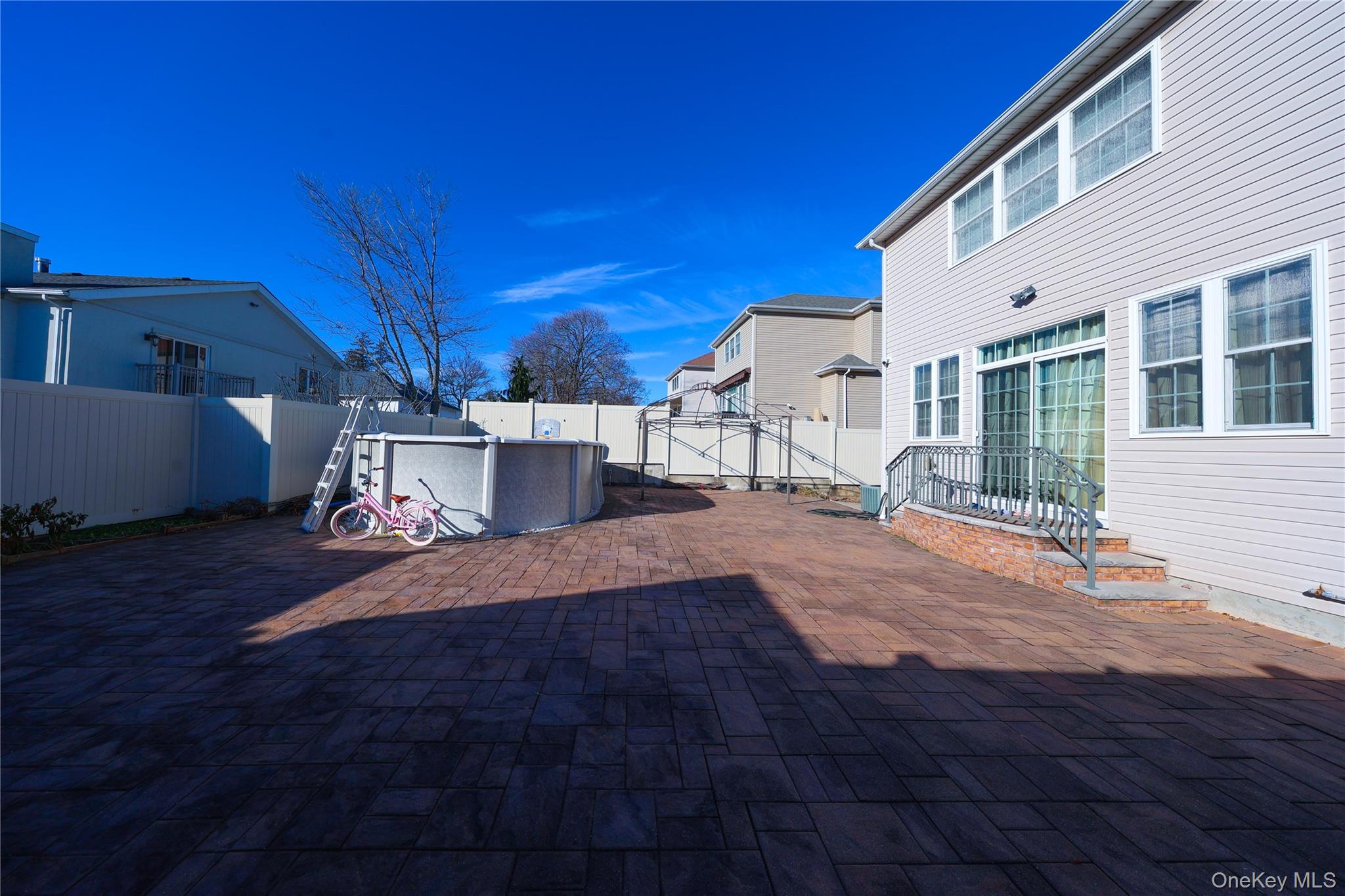 104 Highland Road Staten Island, NY 10308 - Photo 41 of 46 Fenced backyard with a patio