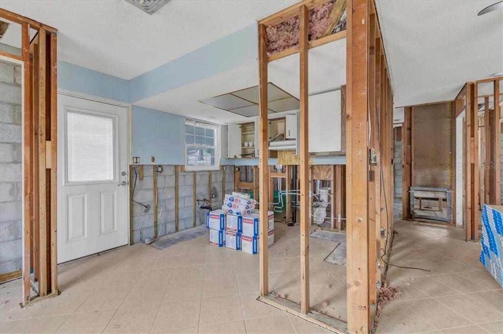 1977 Beach Road, Unit 19 Englewood, FL 34223 - Photo 16 of 47 a view of a hallway with dining area