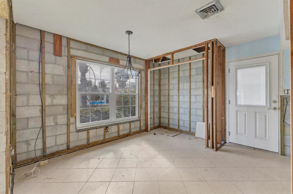 1977 Beach Road, Unit 19 Englewood, FL 34223 - Photo 17 of 47 a view of a room with sliding glass door