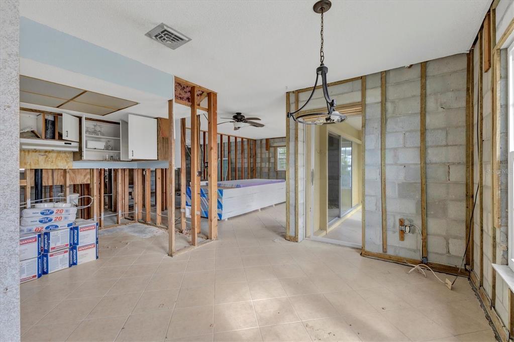 1977 Beach Road, Unit 19 Englewood, FL 34223 - Photo 19 of 47 a view of an empty room with stairs